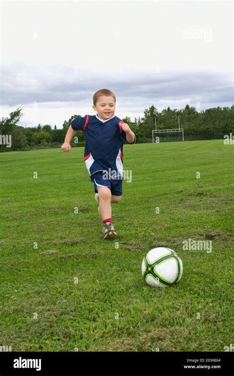 Young Boy Playing Soccer Stock Photo Alamy