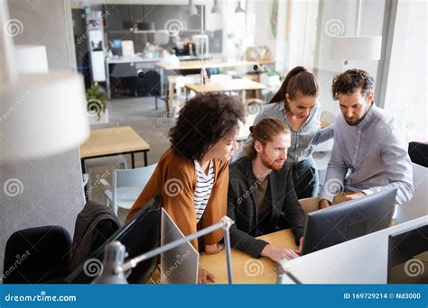 Cheerful Coworkers In Office During Company Meeting Stock Photo Image