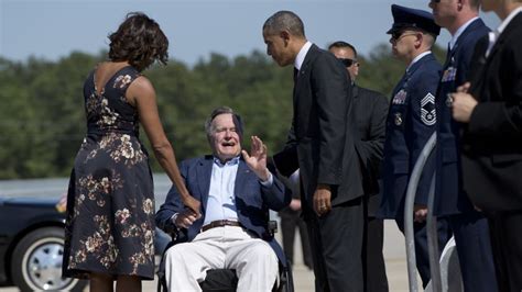 George H W Bush Greets Obamas Cnn Politics