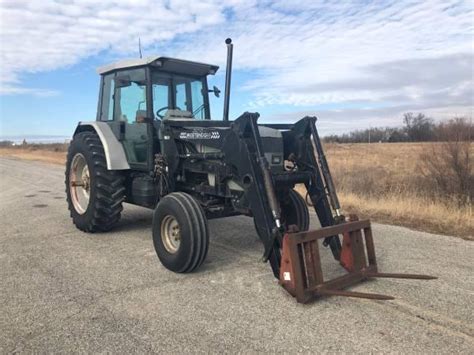 6105 White Tractor With Cab And Loader Nex Tech Classifieds