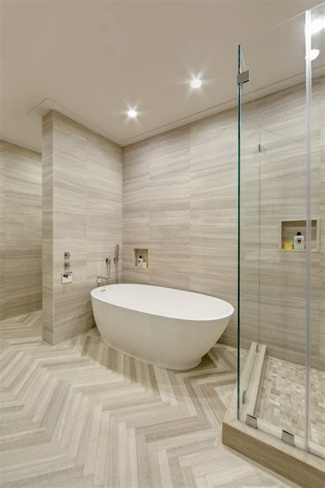High ceiling & herringbone tile floors by Artistic Tile on Inspirationde