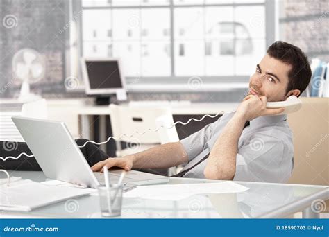 Young Stock Broker On Phone Sitting At Desk Stock Image Image Of