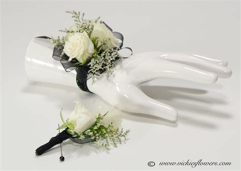 Bat mitzvah dresses, prom dresses, mother of the bride/groom /dresses, sweet 16 dresses, cocktail dresses or black tie gowns; White Rose wrist corsage and boutonniere wrapped with ...