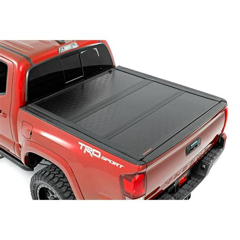 Rough Country Low Profile Hard Tri Fold Fits 2016 2020 Tacoma 5 Ft