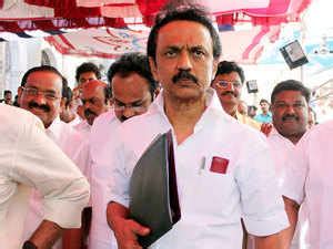 Above, members of dravida munnetra kazhagam (dmk) party distribute sweets among themselves after their party's lead in major seats of the tamil nadu state legislative assembly elections at party. DMK members walk out of Tamil Nadu Assembly - The Economic Times