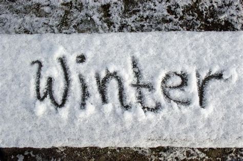 Word Winter Written On A Bench Covered With Snow Stock Photo Image Of
