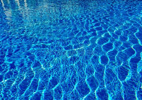 Throbbing Blue Pool Water With Sun Reflections Stock Photo Image Of