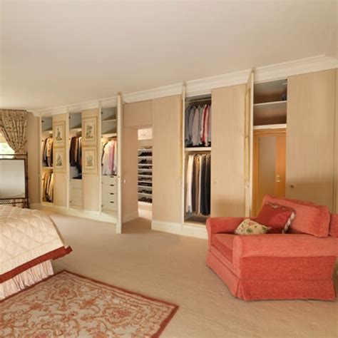 Fabric walls can add a whole new look to your walls without painting or hanging wallpaper that is hard to remove. Master bedroom silk fabric covered wardrobes and walls