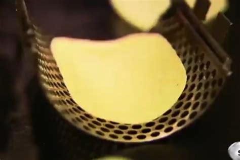 How Do Pringles Crisps Achieve Their Special Shape Factory Footage