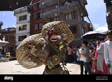 A Nepalese mask dancer performing ritual dance during Gai Jatra or Cow