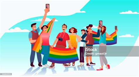 people with lgbt rainbow flags standing together gay lesbian love parade pride festival