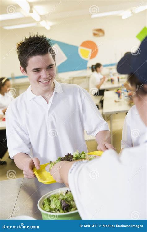 A Student Collecting Lunch In School Cafeteria Stock Image Image Of