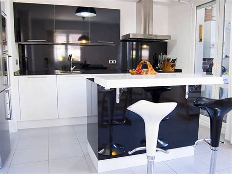 Modern high tech kitchen with view on skyscrapers cityscape. High-Tech Kitchen