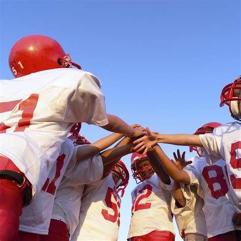 Team Huddle Before The Game Image By © Royalty Freecorbis Sports
