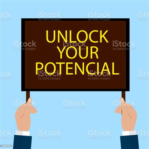Hands Holding A Sign With The Word Unlock Your Potential Stock