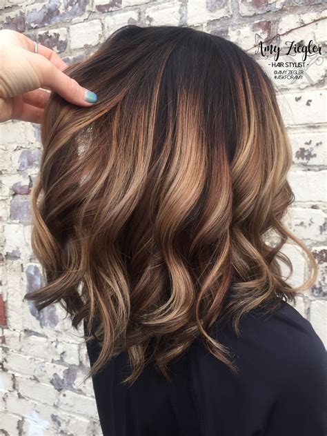 Precision and expertise are keys to creating this modern style. Chunky blonde balayage on dark hair by @askforamy # ...