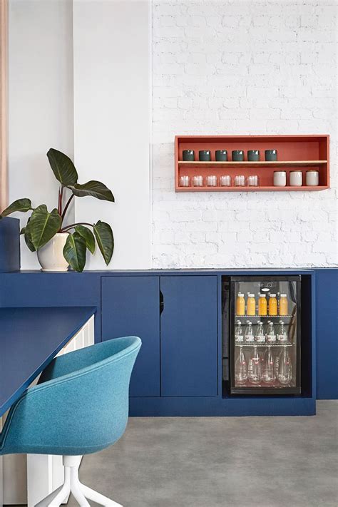 The Concealed Office Kitchenette Clean Lines And Bold Colours Make