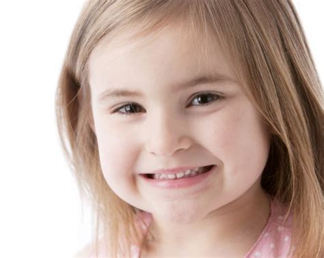 A Closeup Headshot Of A 5 Year Old Caucasian Smiling Little Real Gir