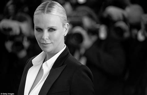 Charlize Theron Sizzles In Androgynous Trouser Charlize Theron Shows Off Her Softer Side As She