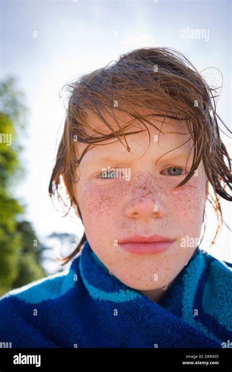 Young Boy Wrapped In Blue Towel Stock Photo Alamy