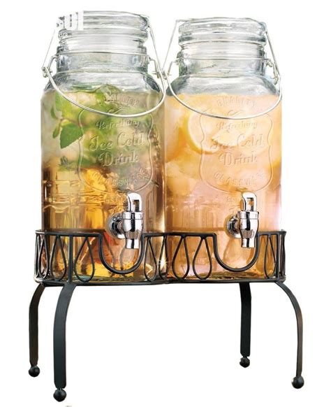 elegant set of two clear glass bail and trigger beverage dispensers with acrylic