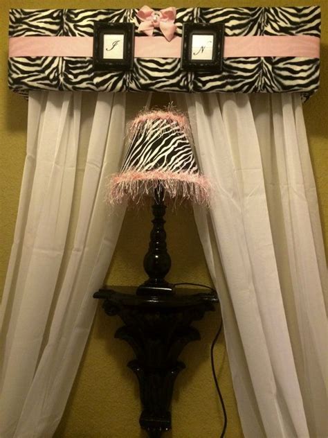 The bed canopy is easy to mount to the wall above the bed or can be used to create a small and cozy corner with soft blankets and pillows. Zebra Cornice Upholstered Bed Canopy by ...