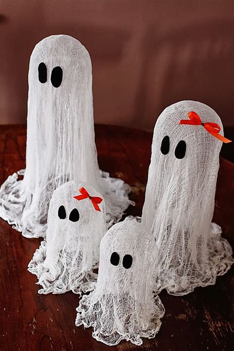 Use cheese cloth to create a ghost centerpiece for your halloween table. Ideas & Products: Halloween Decorations