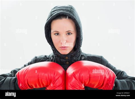 Beautiful Young Woman In Hood And Red Boxing Gloves Stock Photo Alamy