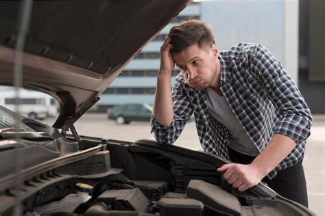 Free Photo Young Man Trying To Repair Car