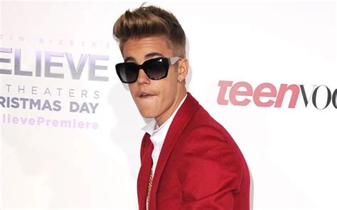 revelan comprometedora fotografía de justin bieber con stripper