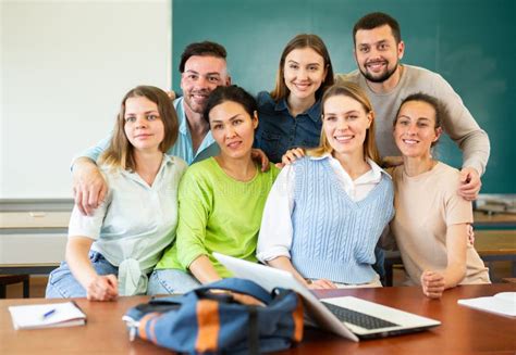Group Portrait Of Group Of University Students In Classroom Stock Image