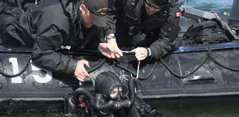 Canadian Armed Forces Divers Participate In Operation To Reduce
