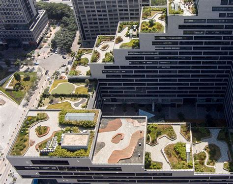 This Building Is Covered In Fully Landscaped Rooftop Terraces