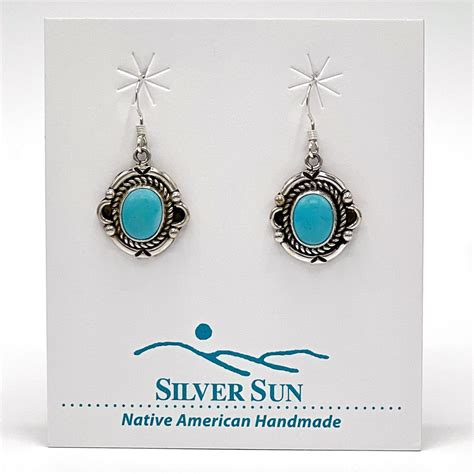 Kingman Turquoise Dangle Earrings Silver Sun