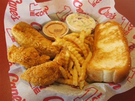 A fingers crossed emoji which displays the index (first) finger crossed over the middle (second) finger. Review: Raising Cane's - Chicken Fingers | Brand Eating