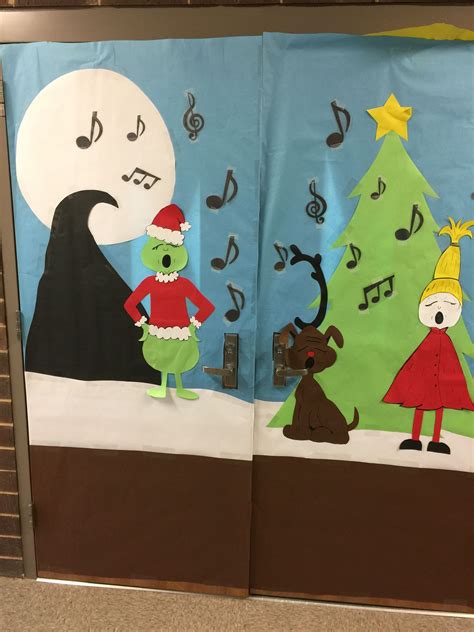 With the use of a jigsaw and projector we bring the grinch to life. Grinch Door Decoration Double Doors Christmas Decor Ideas