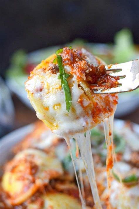 Place 1 cup of sauce on the bottom of 5 to 6 qt. Slow Cooker Ravioli Casserole Recipe - Butter Your Biscuit ...