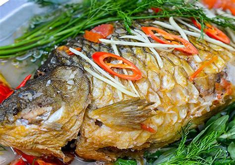 Cách làm cá chép om dưa này với sự kết hợp của dưa chua, thì là, hành lá và nghệ sẽ mang đến cho bạn 1 món ăn dân dã nhưng vừa thơm ngon vừa đẹp mắt lại bổ dưỡng, có thể ăn với bún và rau sống nếu thay cho những bữa cơm trắng thường ngày. Cá chép om dưa: Cách làm với công thức chuẩn thơm ngon nhất