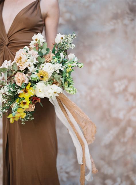 The stems are quickly bound with florist's tape or a tight circle. mary-mcleod-for-amy-osaba-yellow-gold-sage-flowers-wedding ...