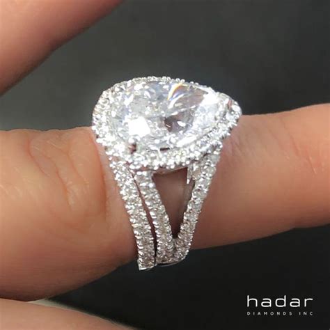 A setting technique that places small, round brilliant cut diamonds in a way that looks. Split-Shank Pear Brilliant Diamond Halo Engagement RIng