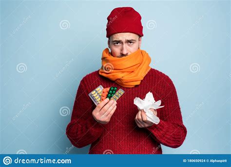 Boy Caught A Cold And Uses Pills To Heal Studio On Cyan Background