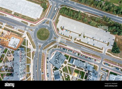 Roundabout Circular Intersection Road And Parking Lots In City
