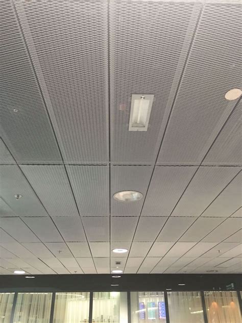 A suspended ceiling can cover a lot of flaws and obstructions, including pipes, wiring, and ductwork. How to Install Drop Ceiling Grid (2020) | Ceiling grid ...