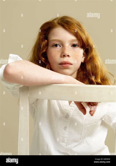 Girls Red Haired Seriously Chair Back Add Support Portrait Child