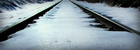 Winter Railroad Tracks Photograph By Julie Dybevik Fine Art America