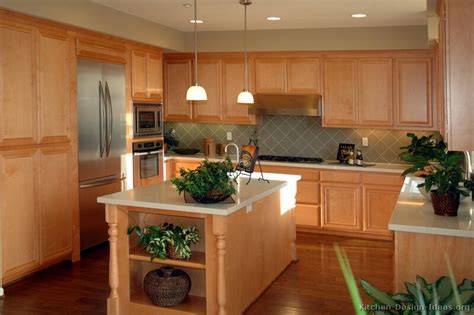 Dark cabinets with glass door panels offer a great contrast natural wood island: Traditional Light Wood Kitchen Cabinets #52 (Kitchen ...