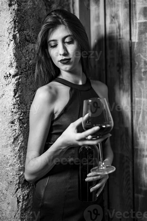 Female Fashionable Model Holding Glass Of Wine Woman Drinking Wine