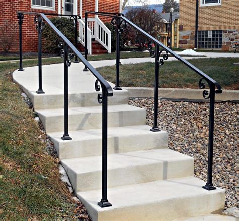 Exterior stairway railings made from wood, wrought iron or aluminum must be installed to provide safety for those using the stairs. exterior-railings | Outdoor stair railing, Outdoor stairs ...