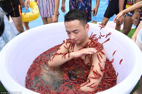 Chinese Chilli Eating Contest Gets Competitors Sweating As They Scoff