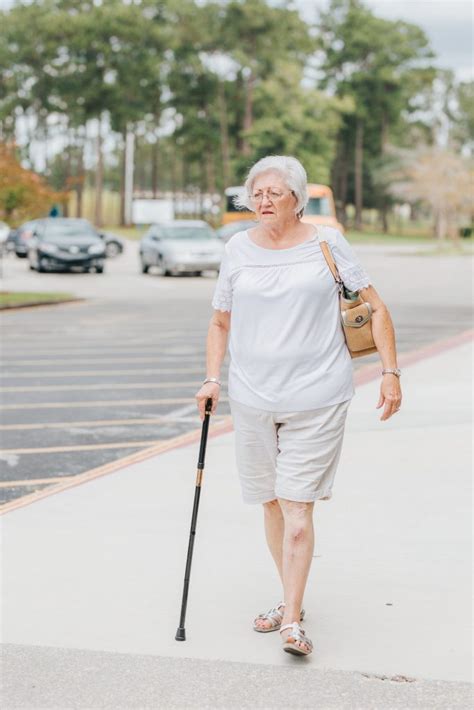 Elderly Woman Walking With A Cane Sage Rehabilitation Hospital